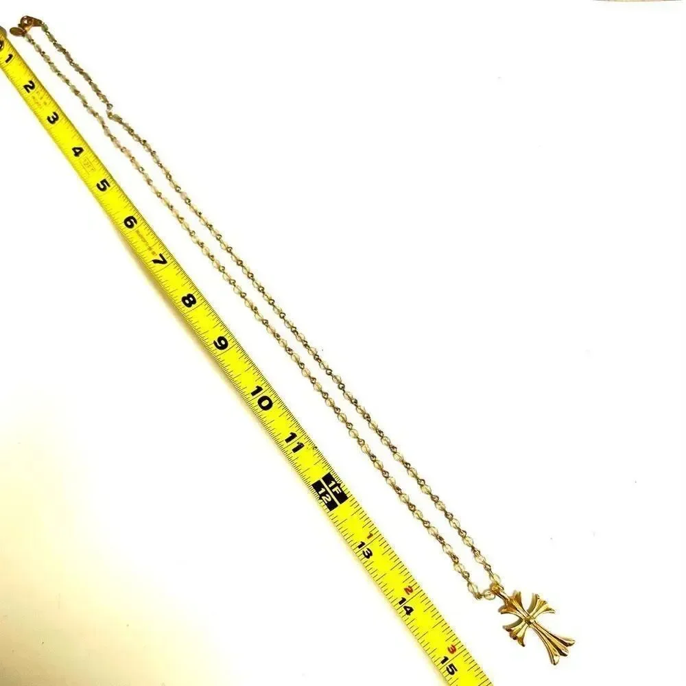 Worthington beaded  gold tone cross necklace